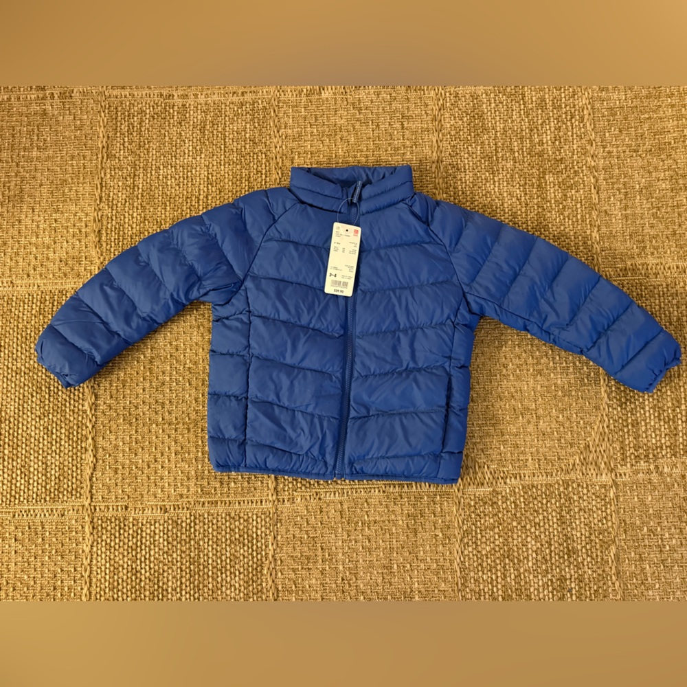 Brand new Uniqlo ultra light puffer jacket size 3-4